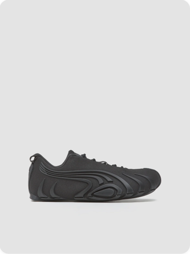 Puma Mostro Triple Black sculptural side view
